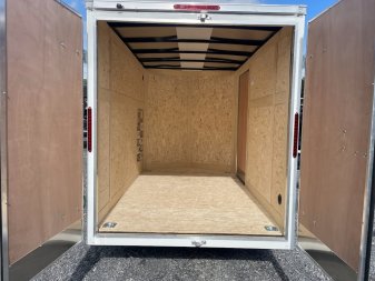 New 2024 Haulmark Passport Deluxe 6x10 Cargo / Enclosed Trailer W/ barn doors