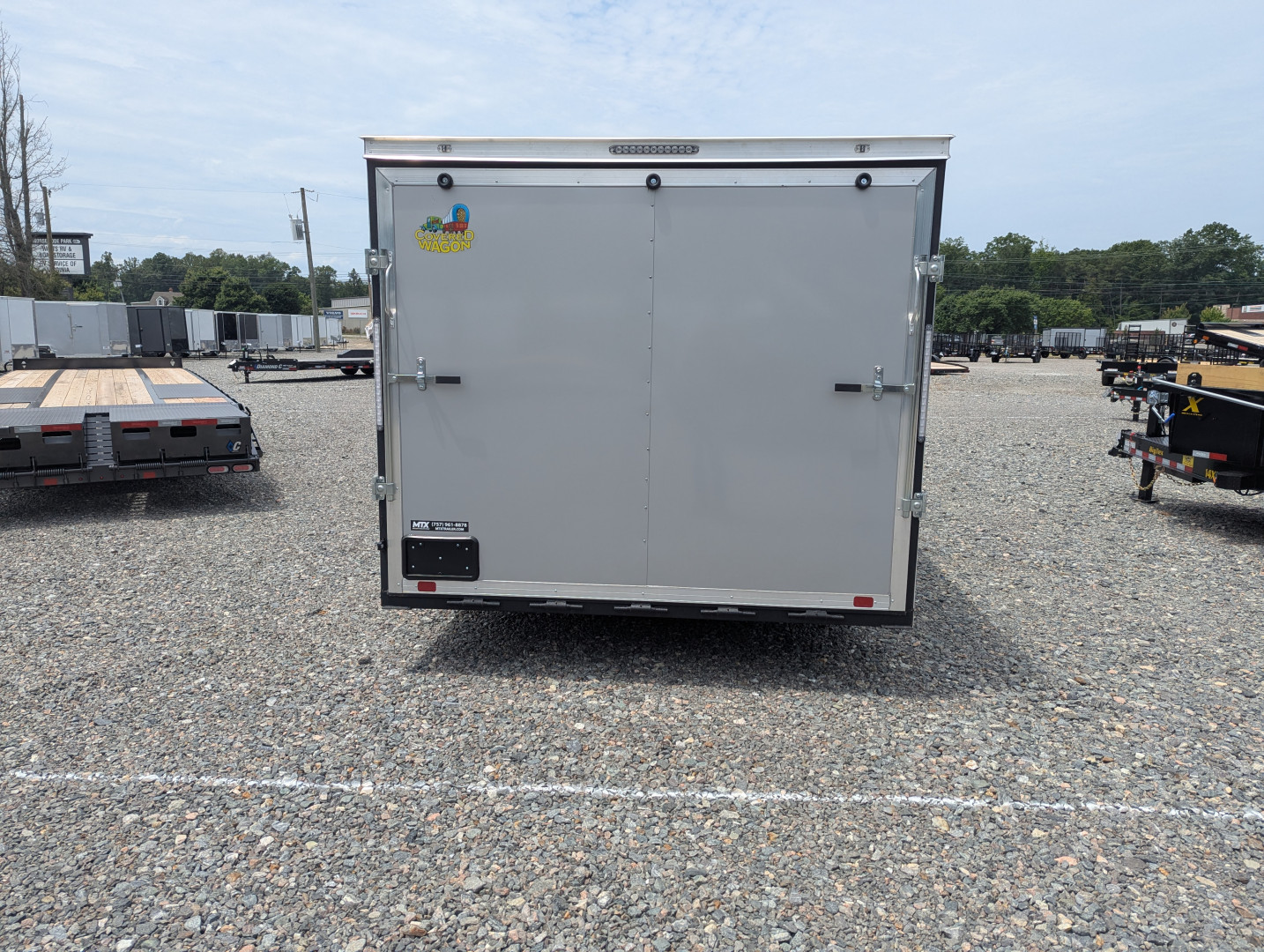 New 2025 Covered Wagon 8.5x24 10K Gold Series w/ Ramp & Escape Door