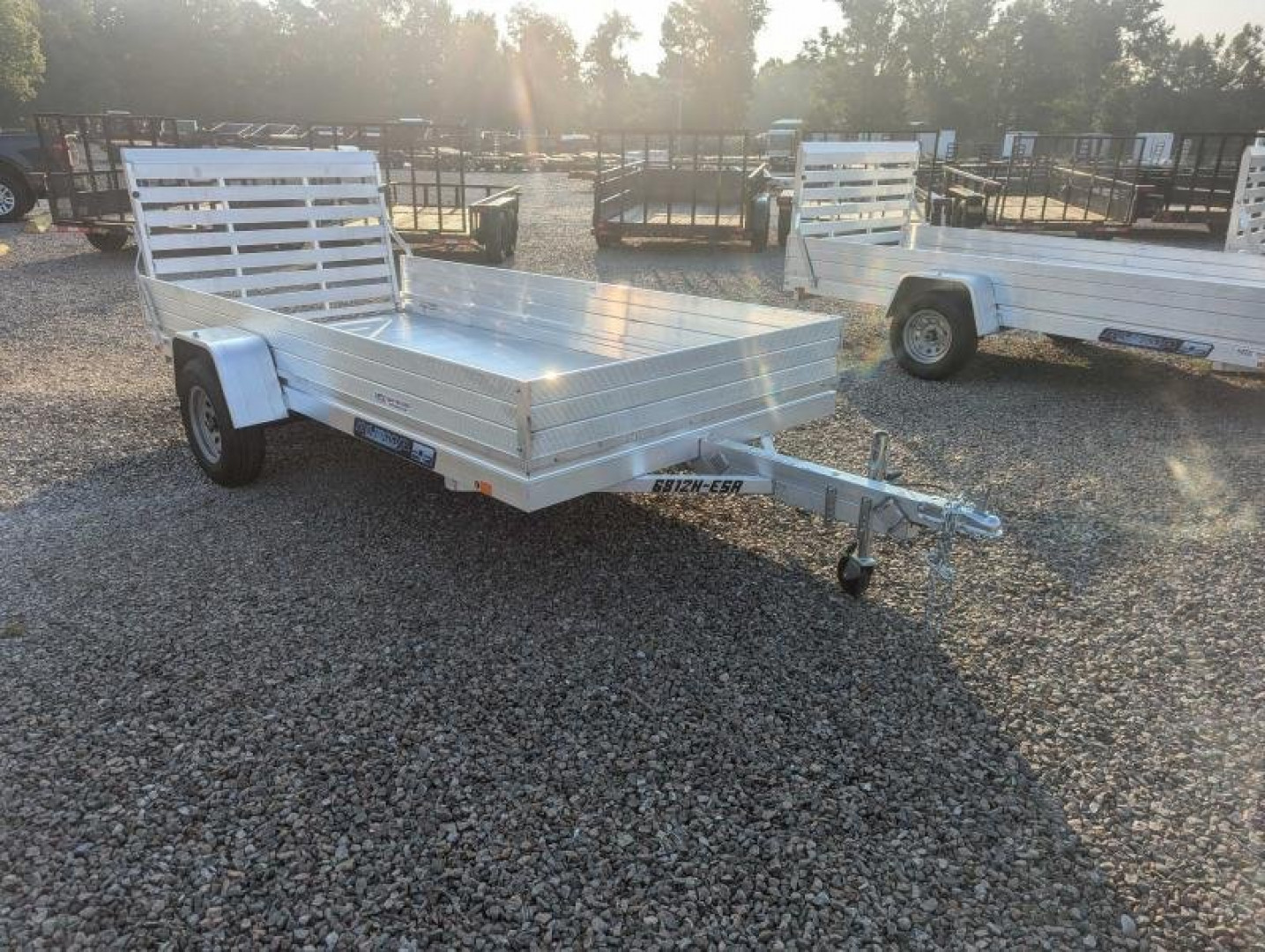 New 2025 ALUMA 6812H w/ 12" Solid Sides & Gate Utility Trailer