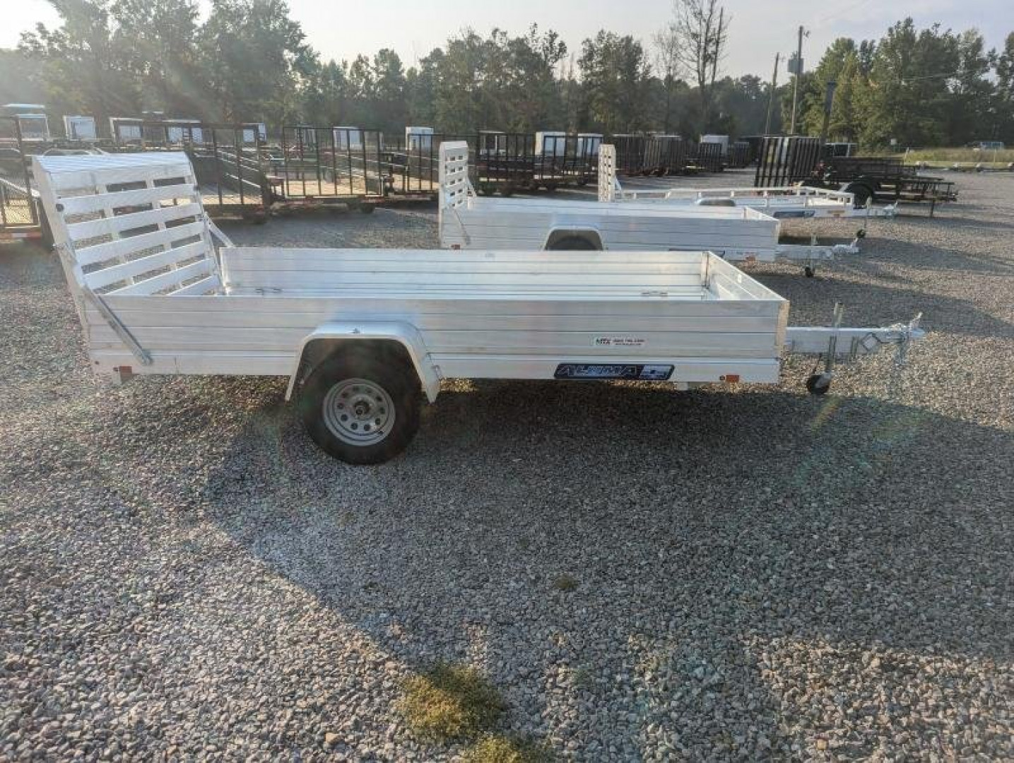 New 2025 ALUMA 6812H w/ 12" Solid Sides & Gate Utility Trailer