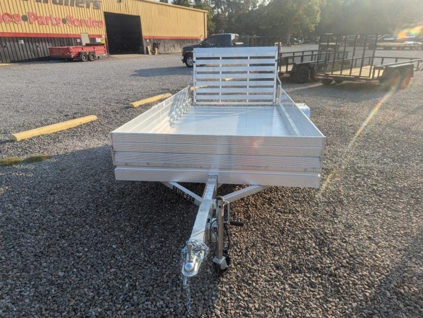 New 2025 ALUMA 6812H w/ 12" Solid Sides & Gate Utility Trailer