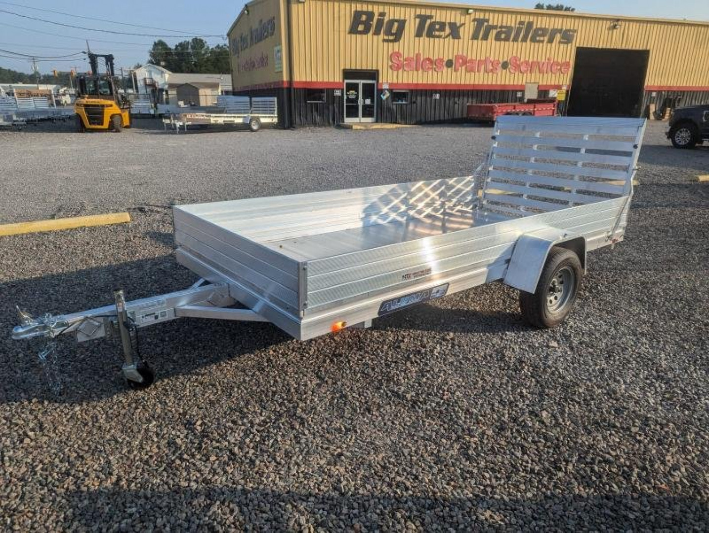 New 2025 ALUMA 6812H w/ 12" Solid Sides & Gate Utility Trailer