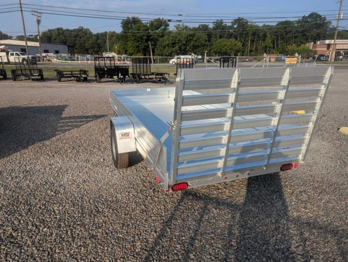 New 2025 ALUMA 6812H w/ 12" Solid Sides & Gate Utility Trailer