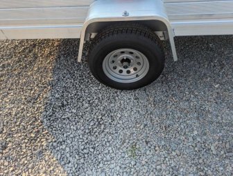 New 2025 ALUMA 6812H w/ 12" Solid Sides & Gate Utility Trailer