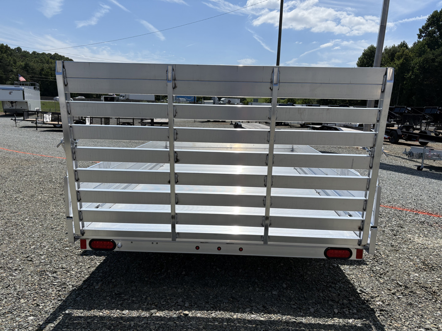 New 2024 ALUMA 7810ES Utility Trailer w/ 12" Solid Sides