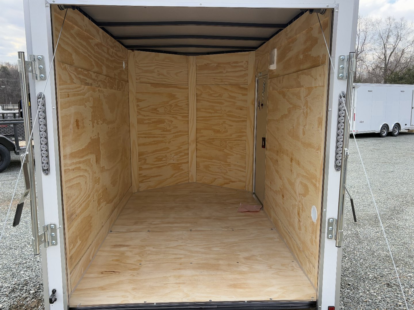 New 2025 ANVIL 5X8 Enclosed w/ 6" Extra Height, Ramp Door & Poly-Core Exterior