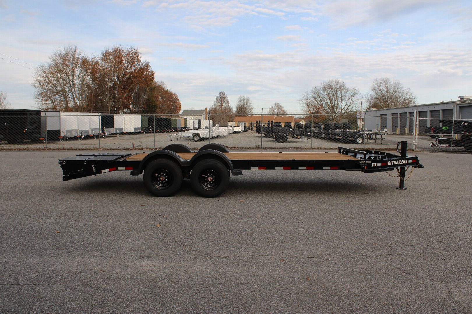New 2025 PJ TRAILERS EV 20' Equipment Trailer w/ Monster Ramps *plus an additional $300 Rebate*