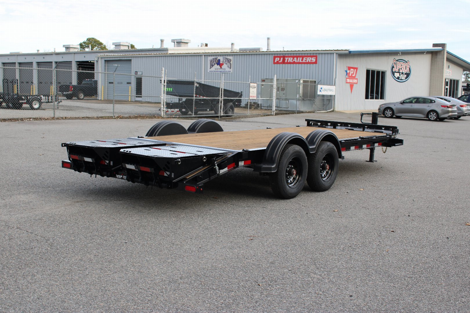New 2025 PJ TRAILERS EV 20' Equipment Trailer w/ Monster Ramps *plus an additional $300 Rebate*