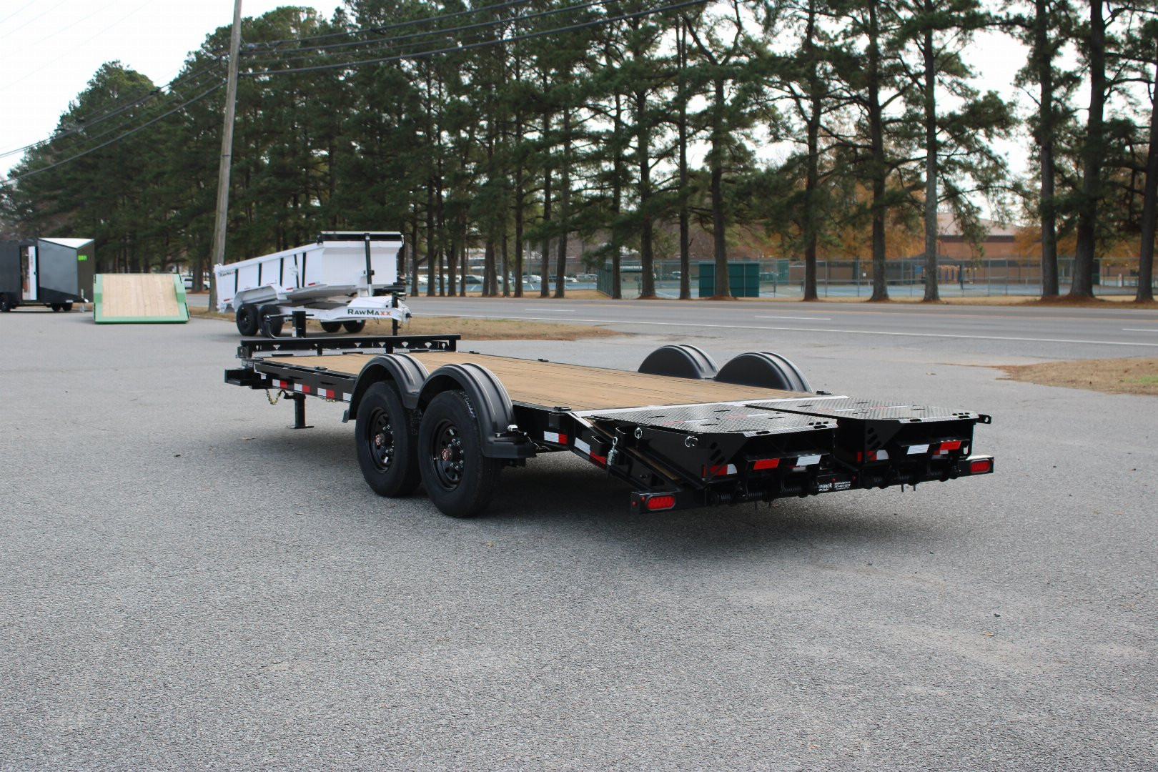 New 2025 PJ TRAILERS EV 20' Equipment Trailer w/ Monster Ramps *plus an additional $300 Rebate*