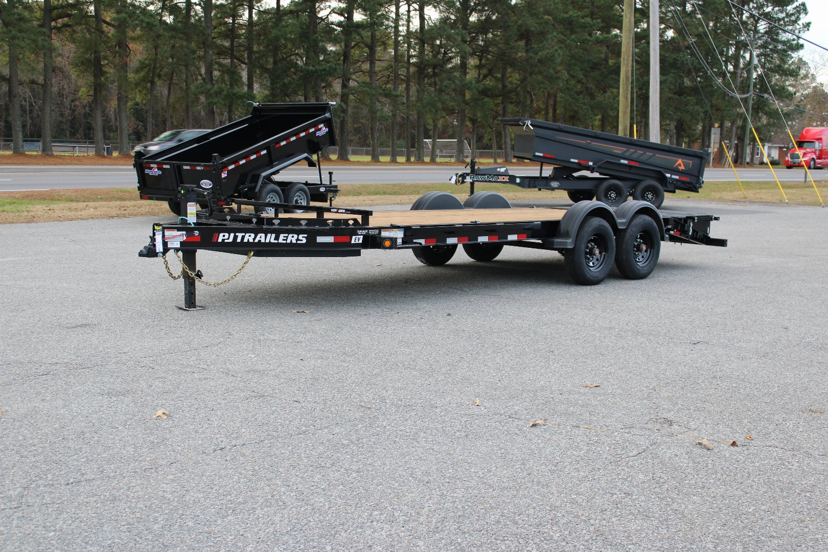 New 2025 PJ TRAILERS EV 20' Equipment Trailer w/ Monster Ramps *plus an additional $300 Rebate*