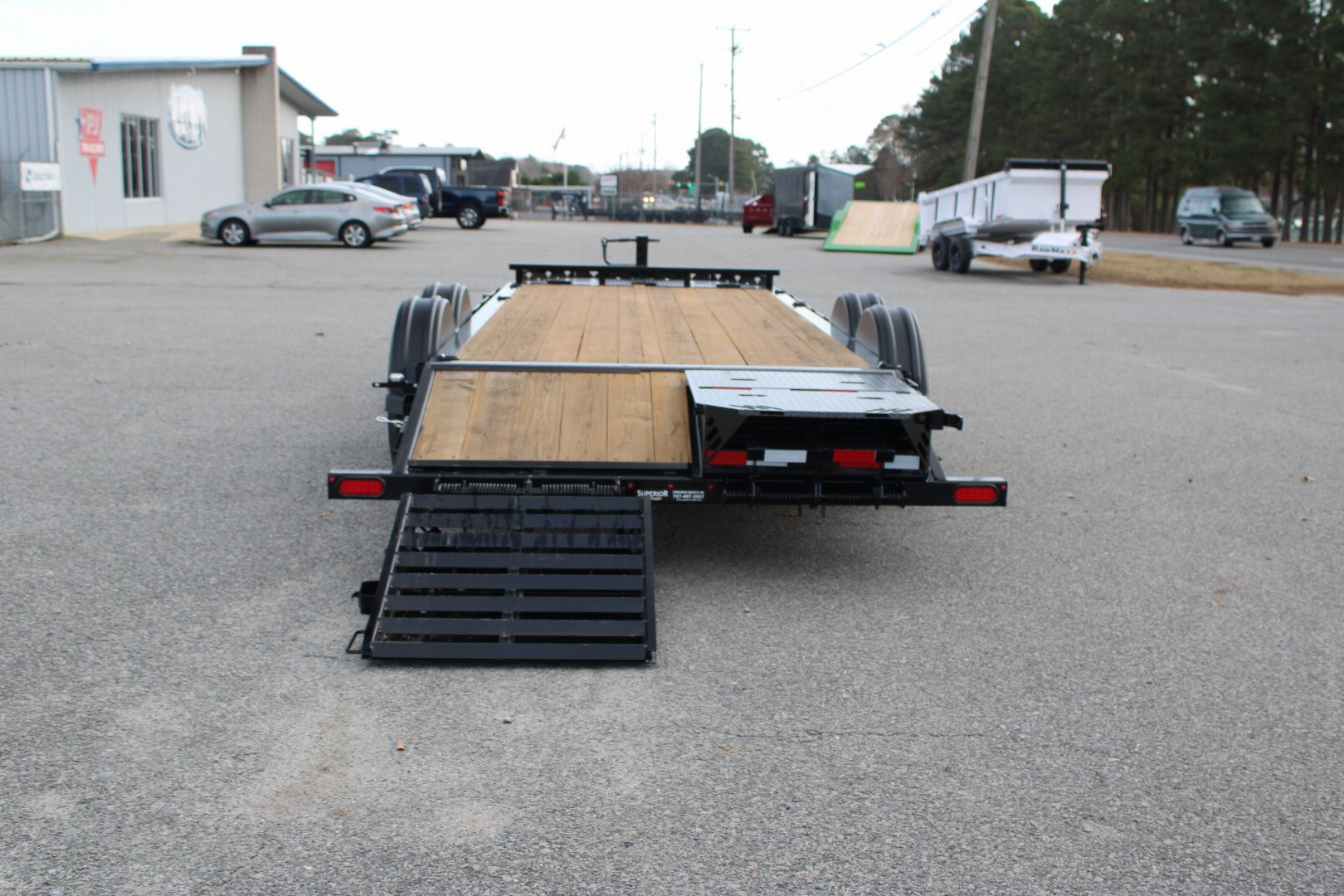 New 2025 PJ TRAILERS EV 20' Equipment Trailer w/ Monster Ramps *plus an additional $300 Rebate*