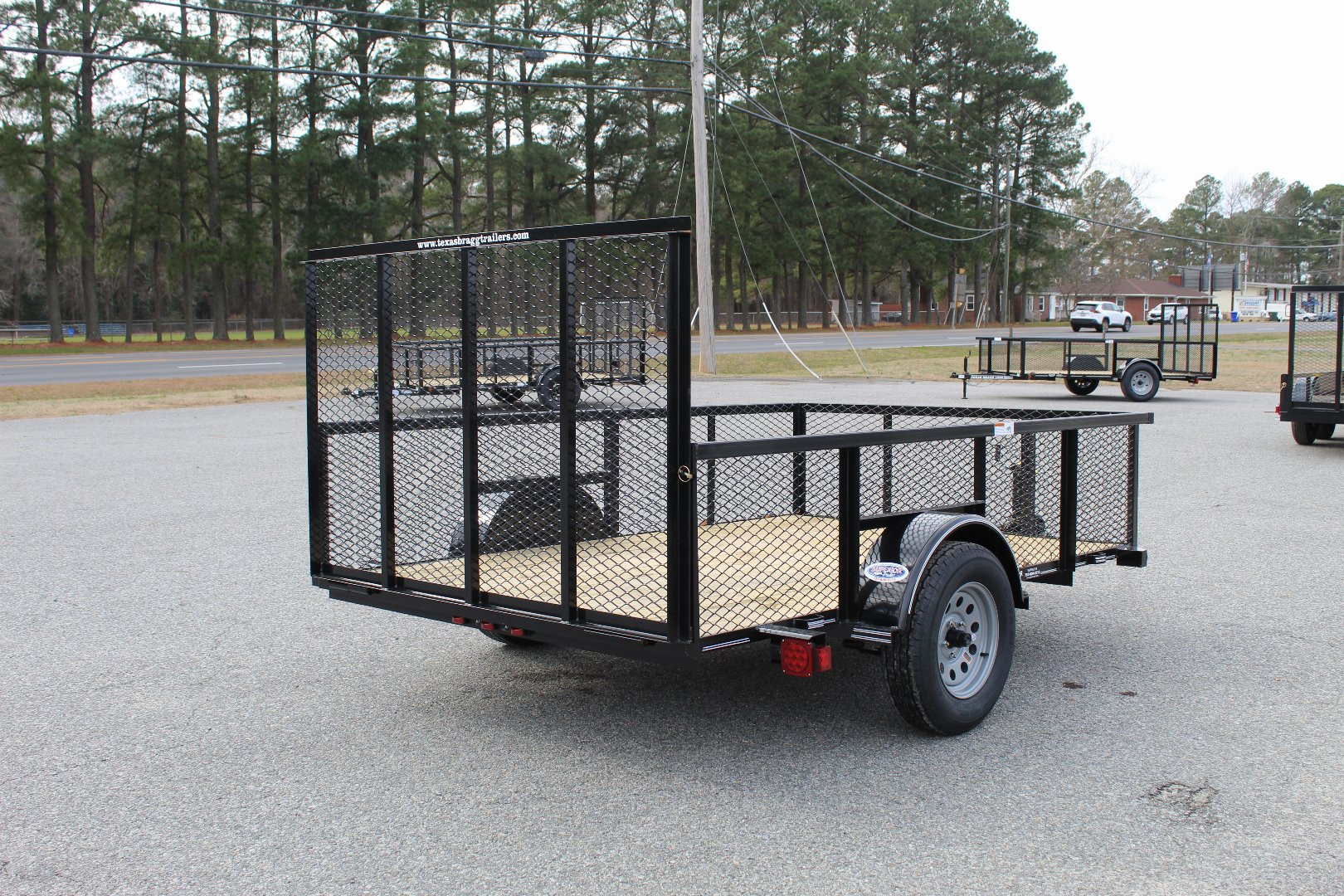 New 2024 TEXAS BRAGG TRAILERS 6x10LD w/ Gate and 2ft Expanded Sides Utility Trailer