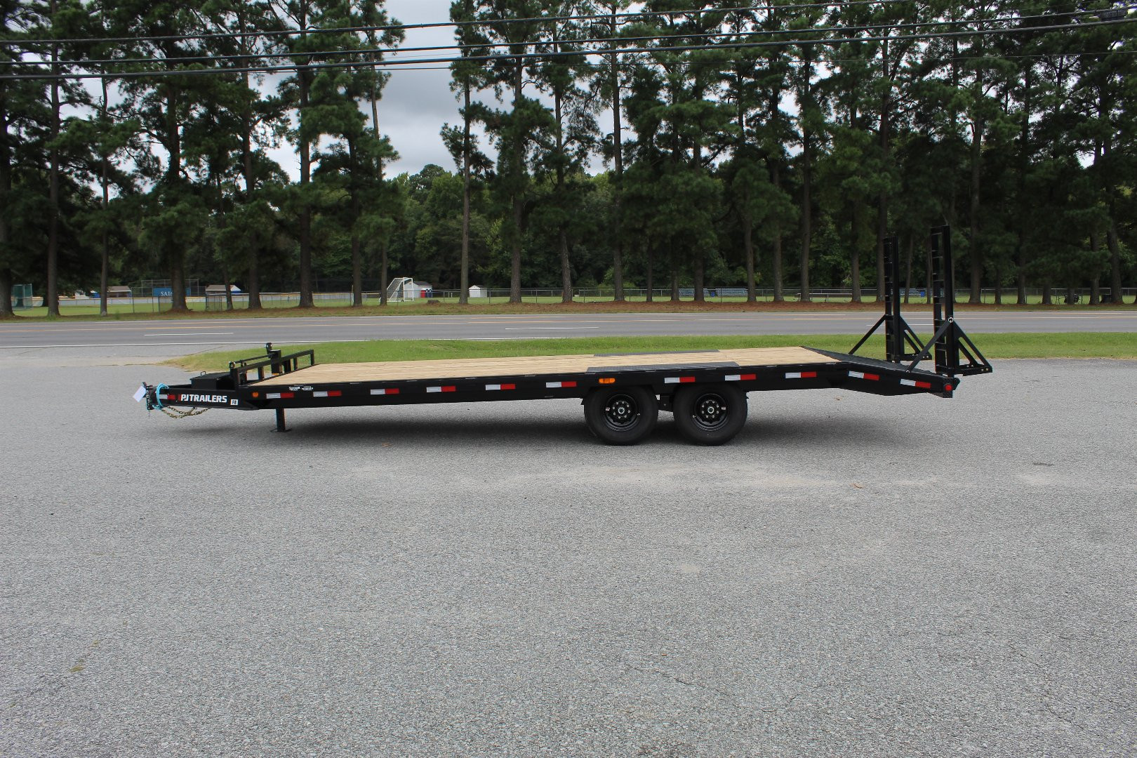 New 2025 PJ TRAILERS 24ft F8 14K w/ Fold Up Ramps Deckover Trailer