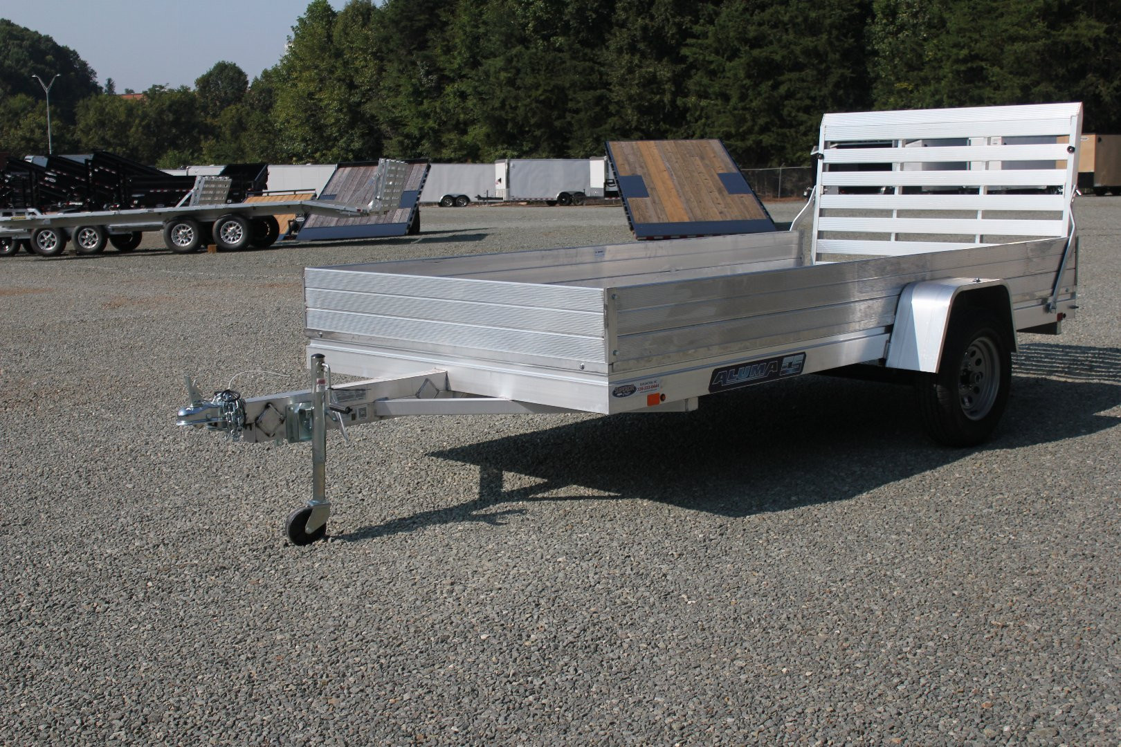 New 2025 ALUMA 6812H w/ 12" Solid Sides & Gate Utility Trailer
