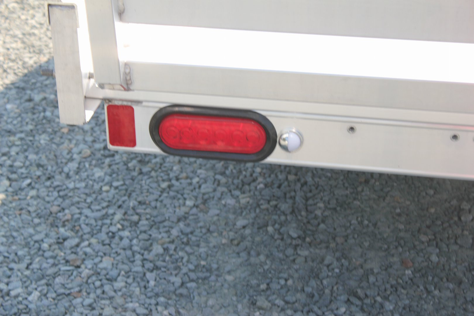 New 2025 ALUMA 6812H w/ 12" Solid Sides & Gate Utility Trailer