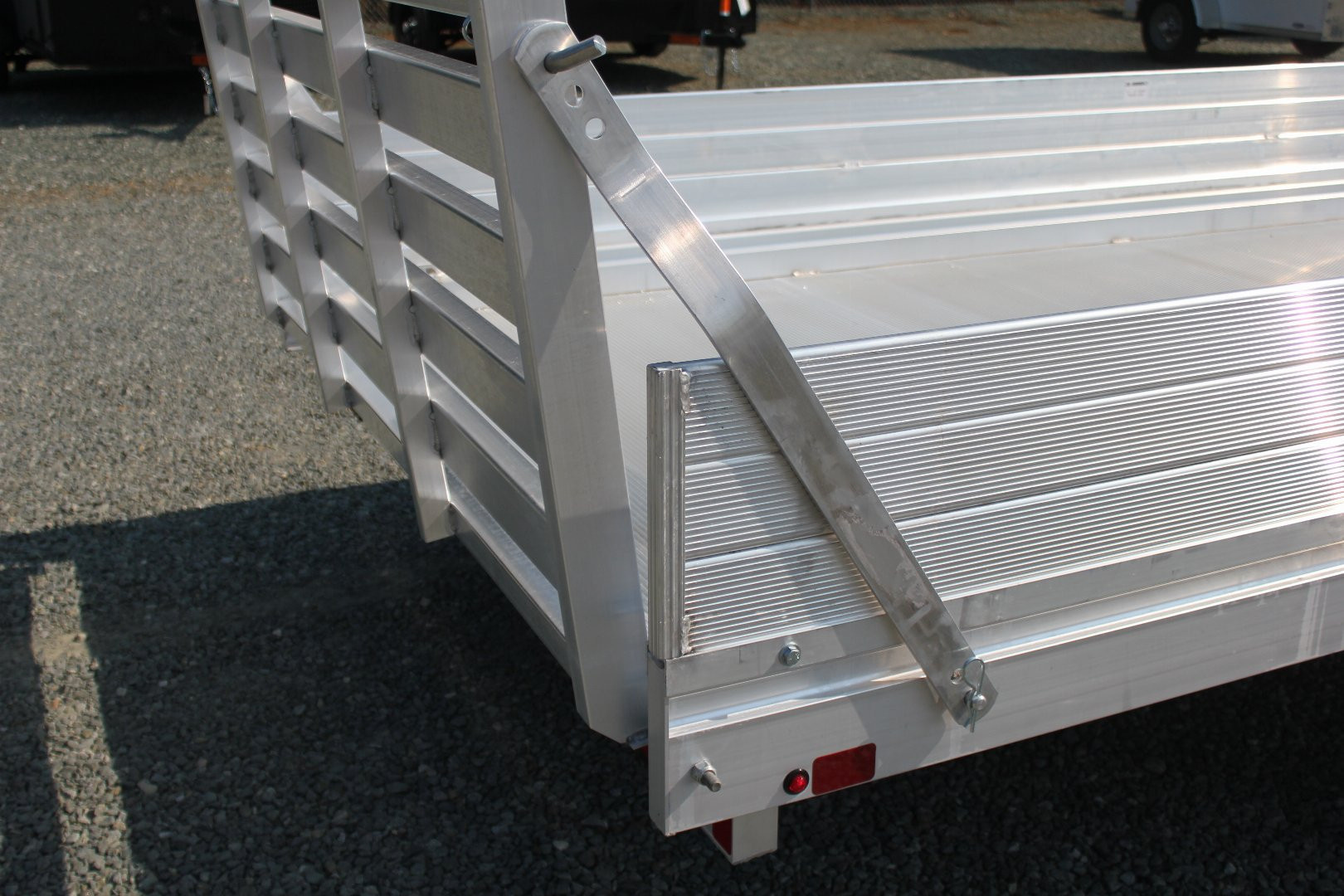 New 2025 ALUMA 6812H w/ 12" Solid Sides & Gate Utility Trailer