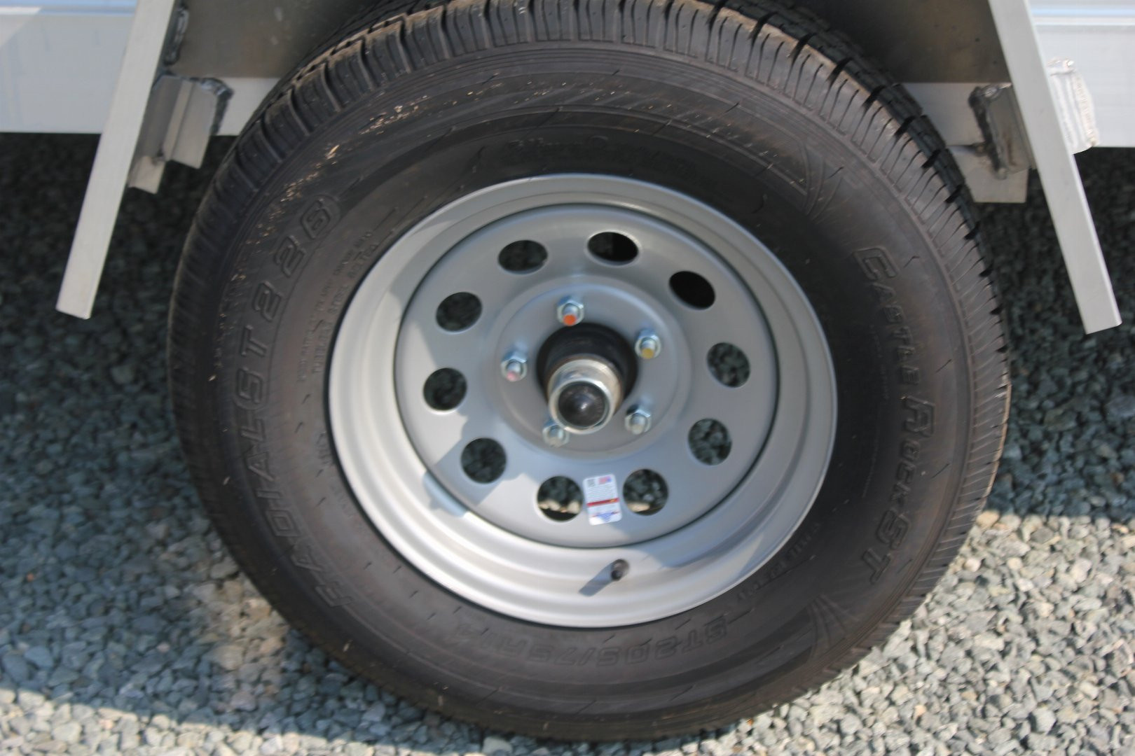 New 2025 ALUMA 6812H w/ 12" Solid Sides & Gate Utility Trailer