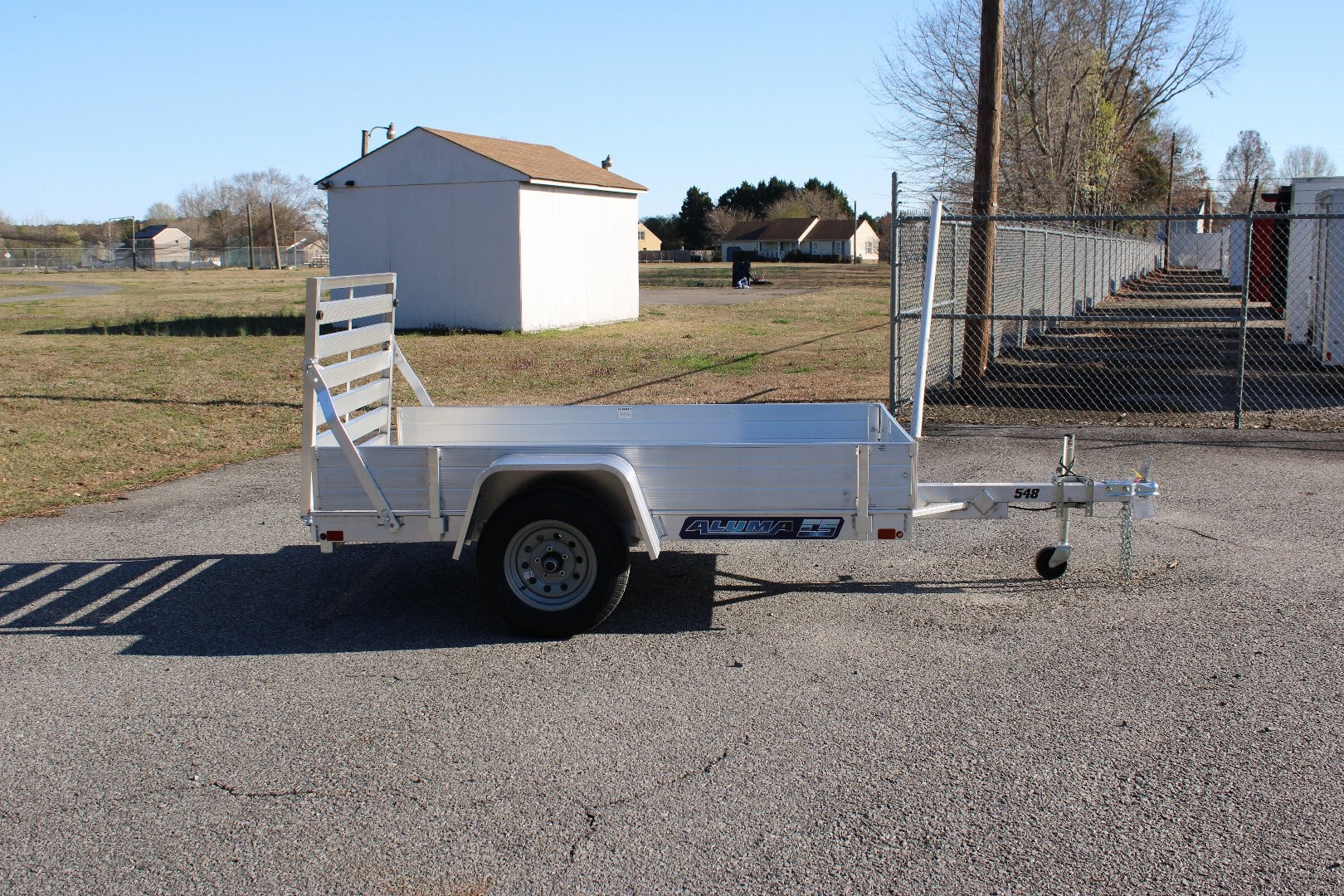 New 2025 ALUMA 548 w/ 12" Solid Sides and Tailgate Utility Trailer