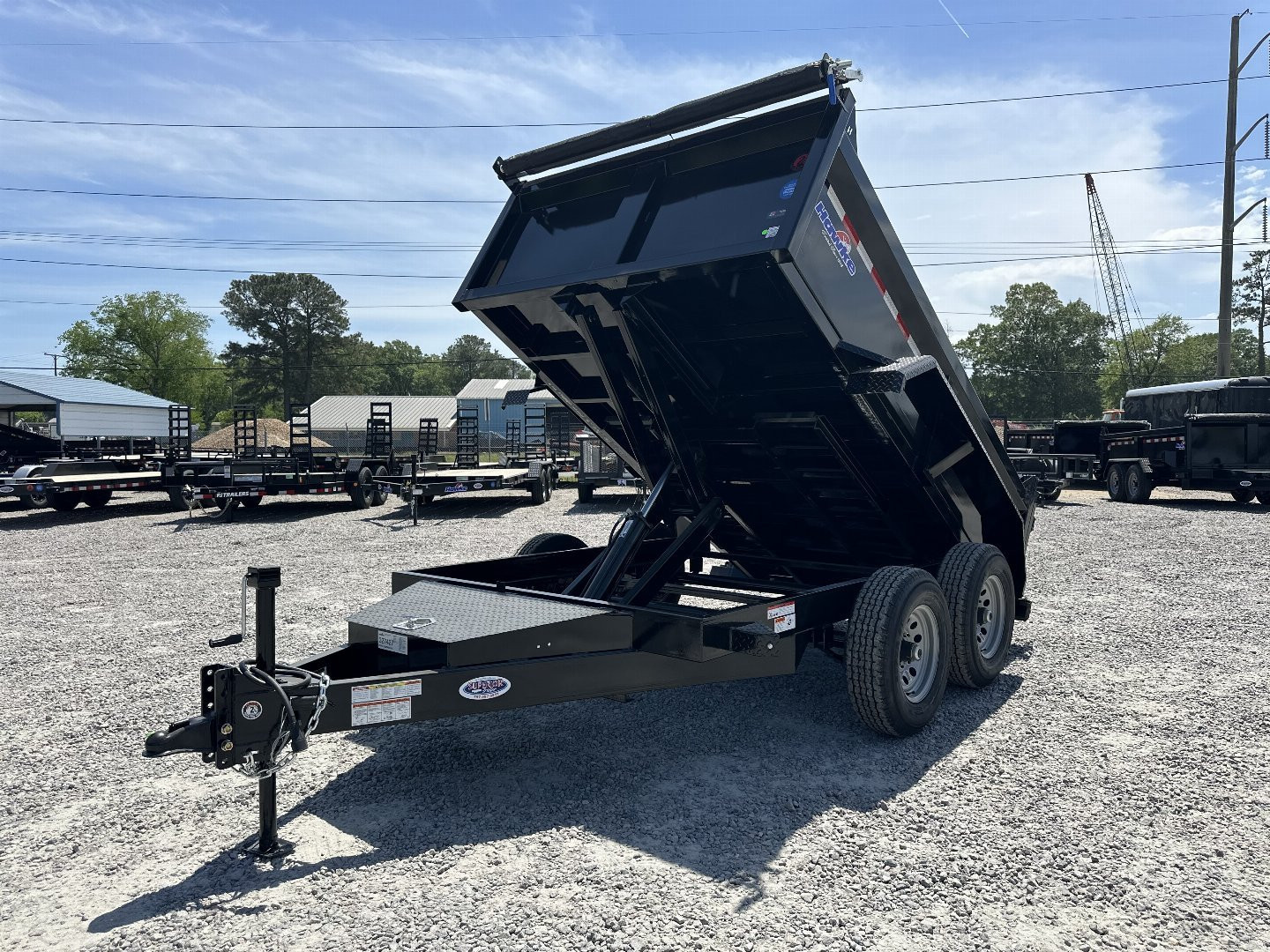 New 2024 HAWKE TRAILERS 6X10 10K Dump w/ Spreader Gate and Ramps Dump Trailer