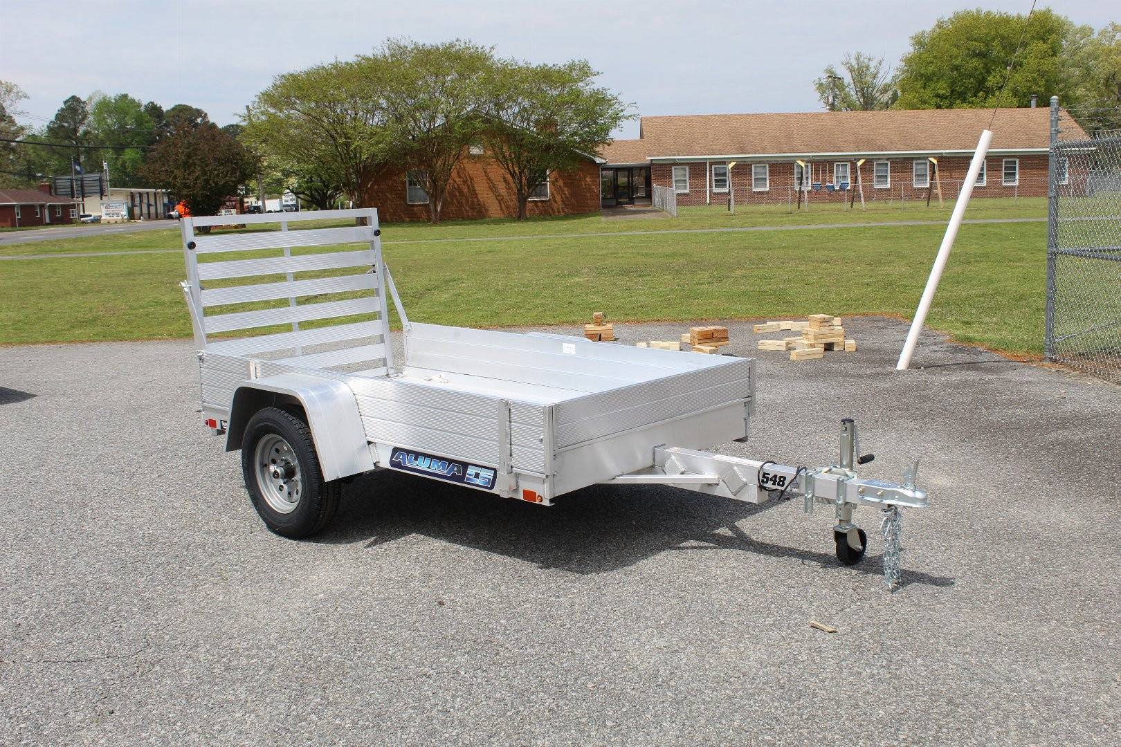 New 2025 ALUMA 548 w/ 12" Solid Sides and Tailgate Utility Trailer