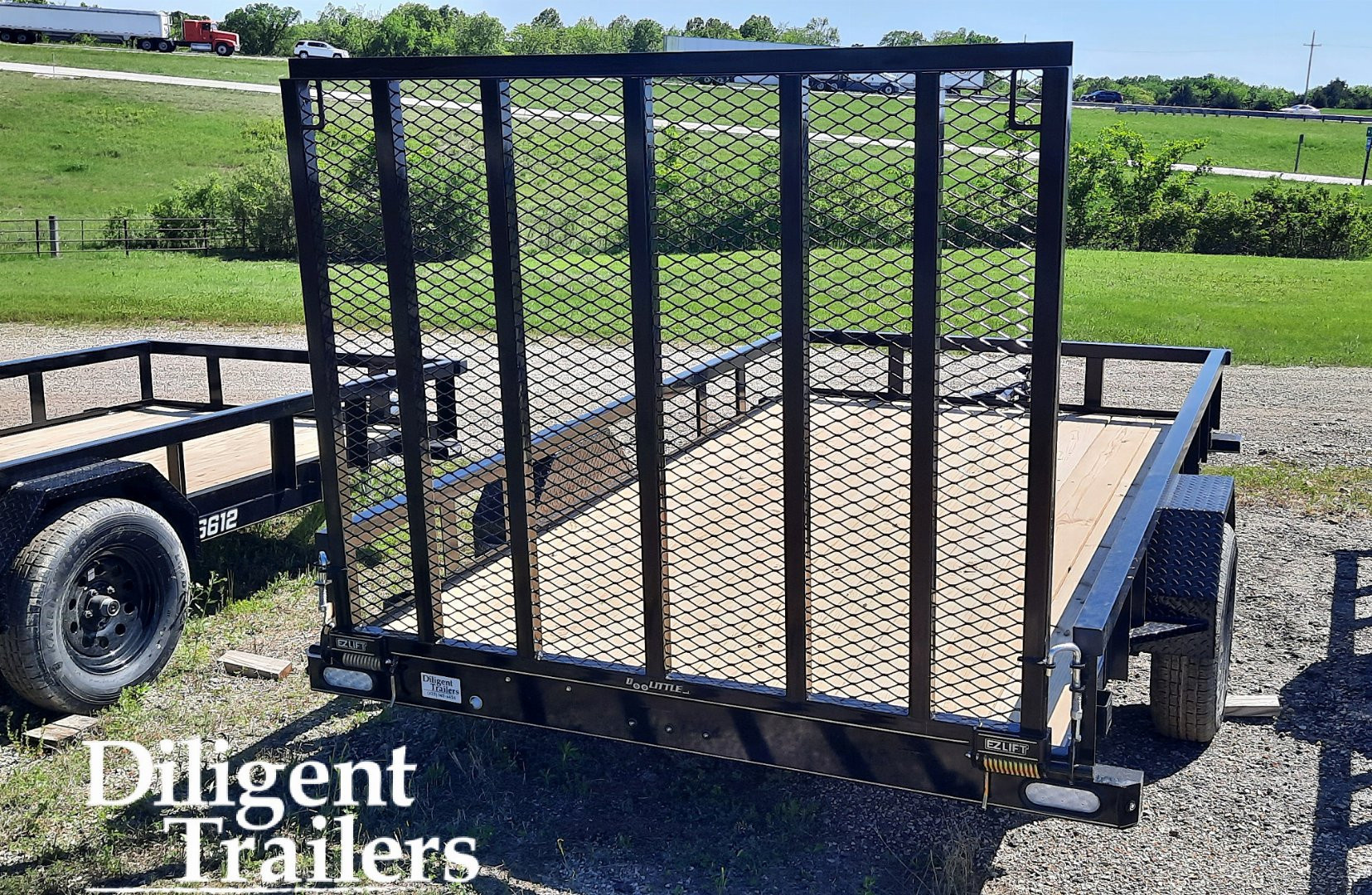 New 2025 DOOLITTLE TRAILER MFG 77" x12' Utility Trailer