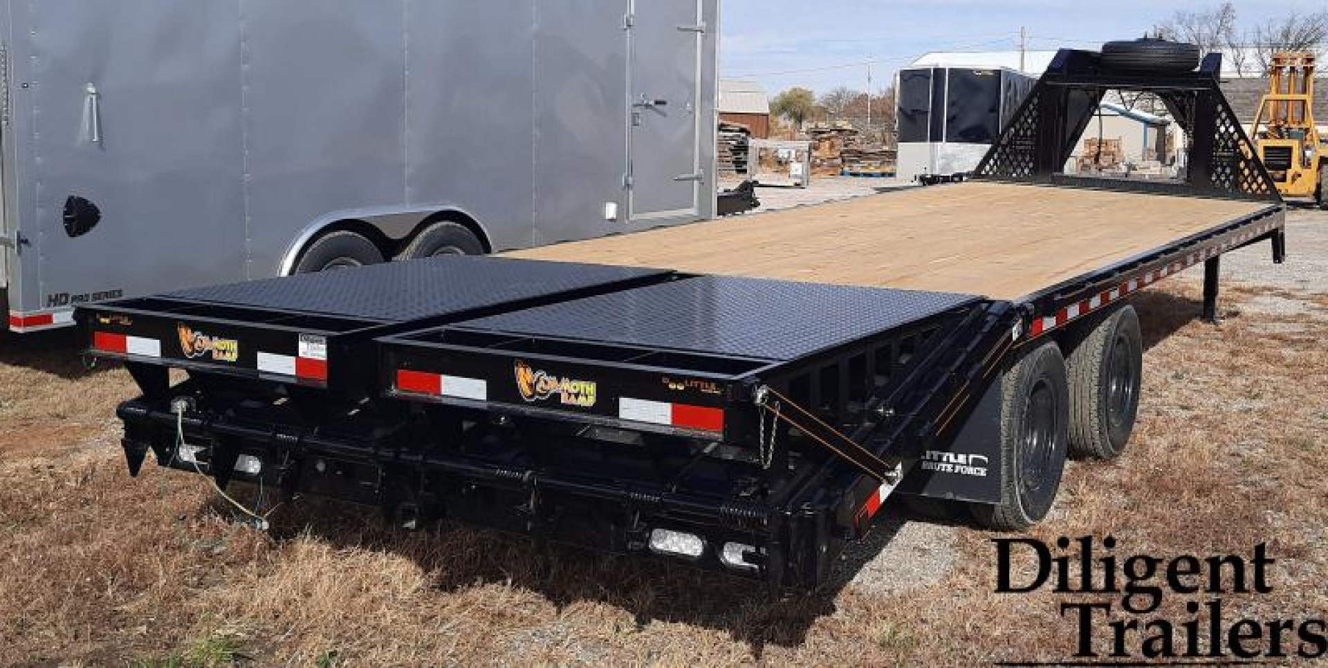 New 2023 Doolittle Trailer Mfg 102"x25' Tandem Axle 22K Deckover