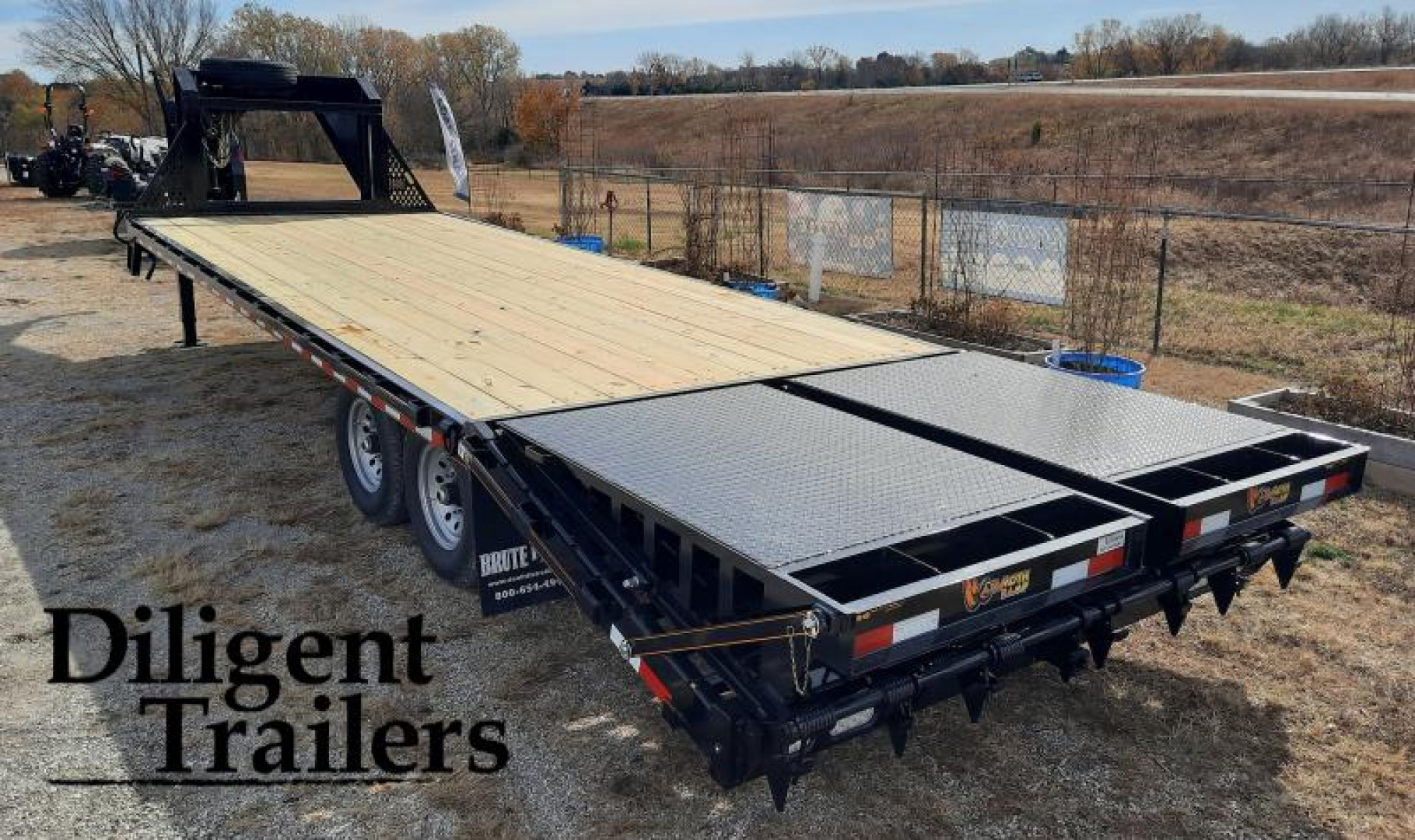 New 2023 Doolittle Trailer Mfg 102"x25' Tandem Axle 14K Deckover