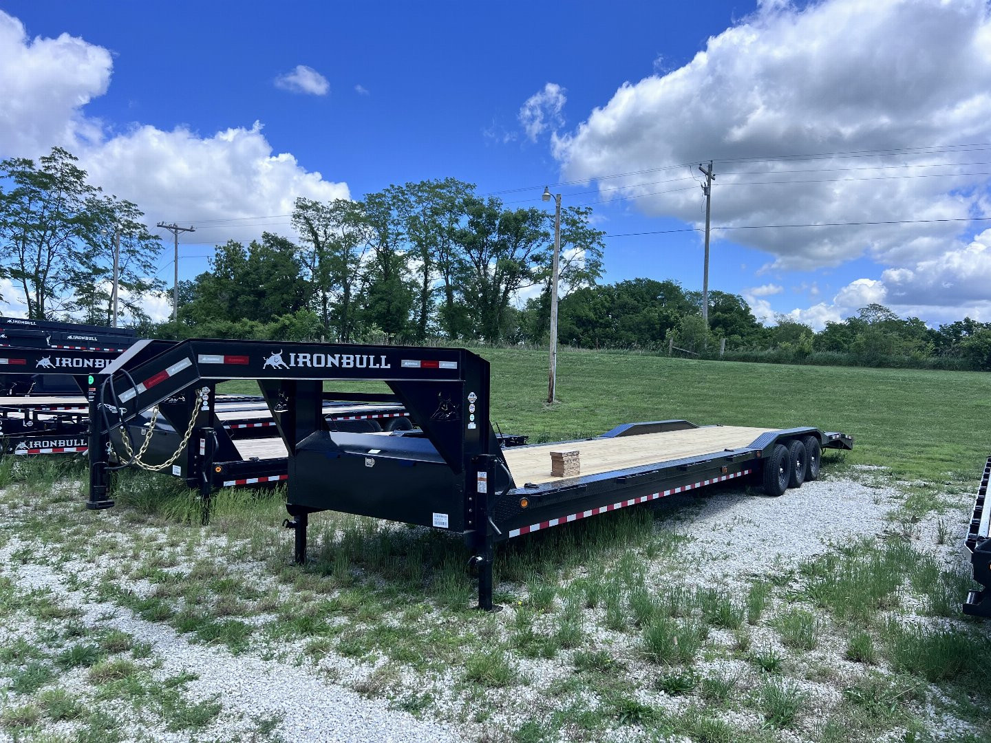 New 2026 IRON BULL 102 X 40 GOOSENECK EQUIPMENT TRAILER W/ TRIPLE AXLES AND DRIVE OVER FENDERS