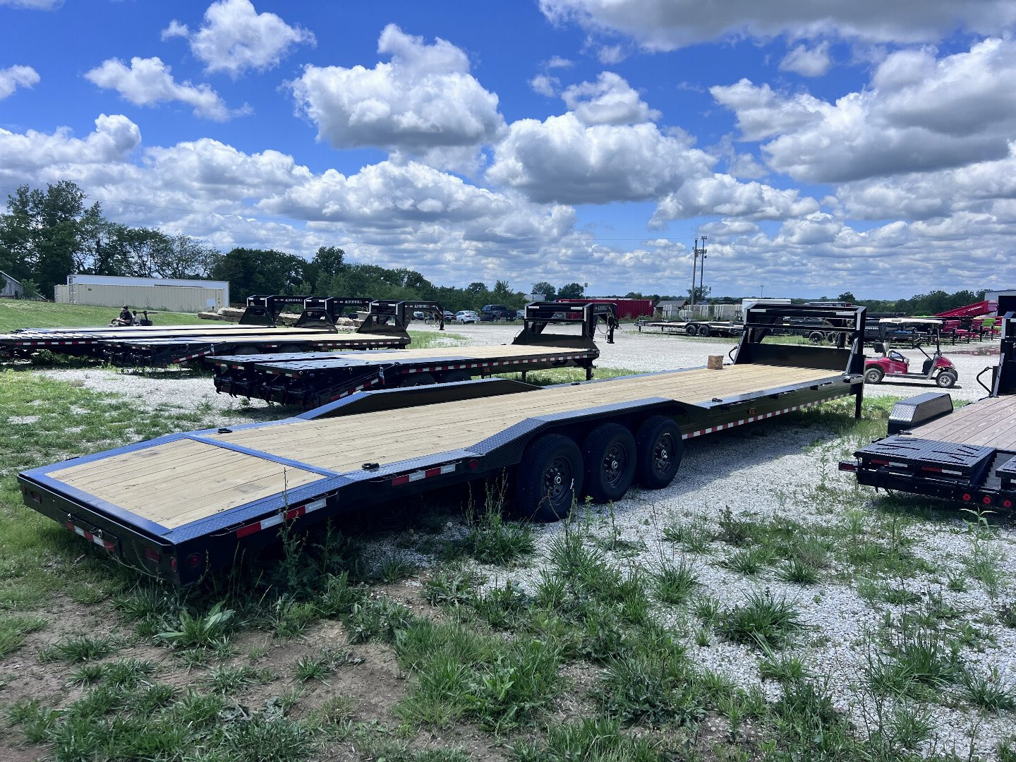 New 2026 IRON BULL 102 X 40 GOOSENECK EQUIPMENT TRAILER W/ TRIPLE AXLES AND DRIVE OVER FENDERS