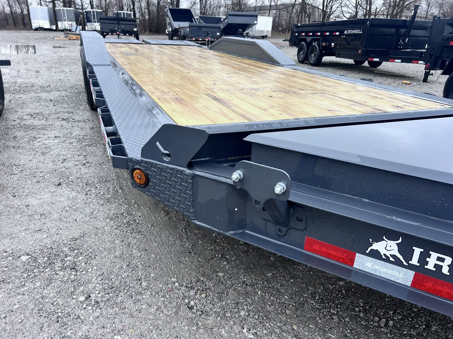 New 2025 IRON BULL 102X24 EQUIPMENT TRAILER W/8K AXLES, 16 PLY TIRES AND RAMPAGE RAMPS