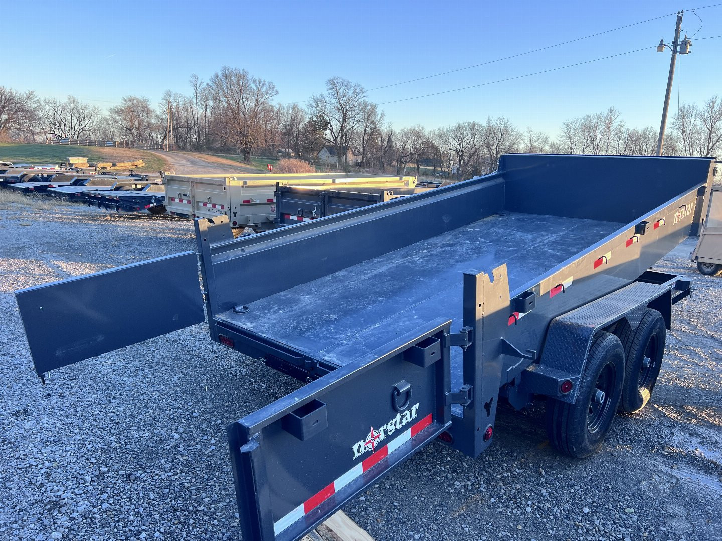 New 2025 NORSTAR 83X14 DUMP TRAILER W/20" SIDES