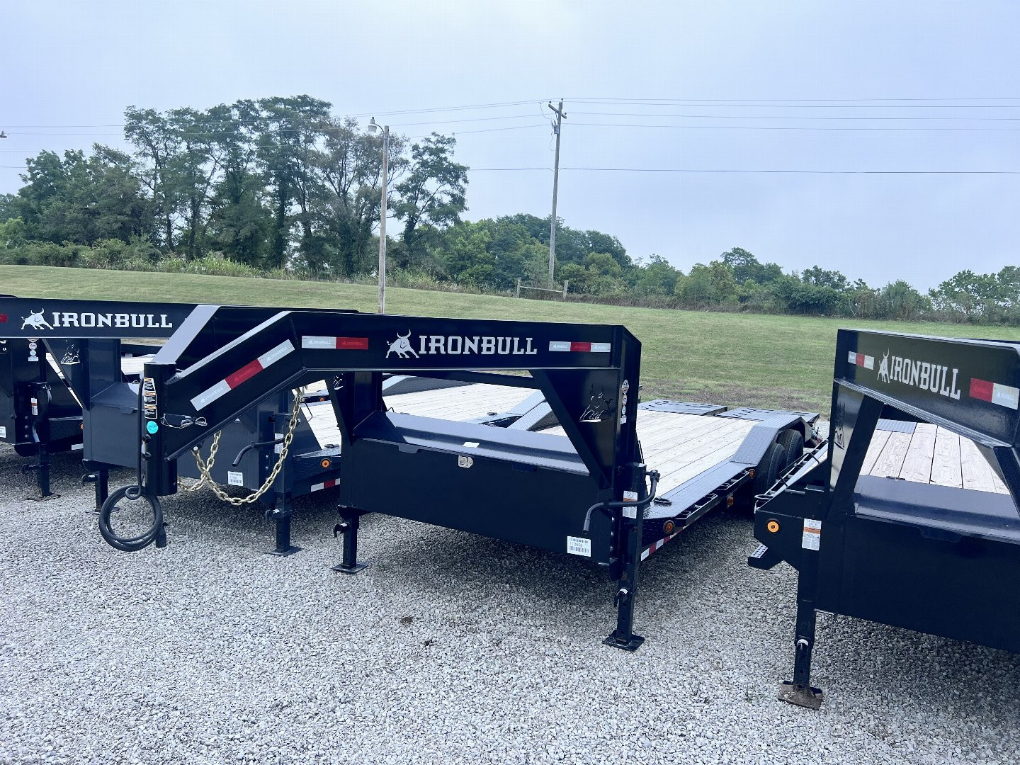 New 2024 IRON BULL 102X22 GOOSENECK EQUIPMENT TRAILER W/ DRIVE OVER FENDERS