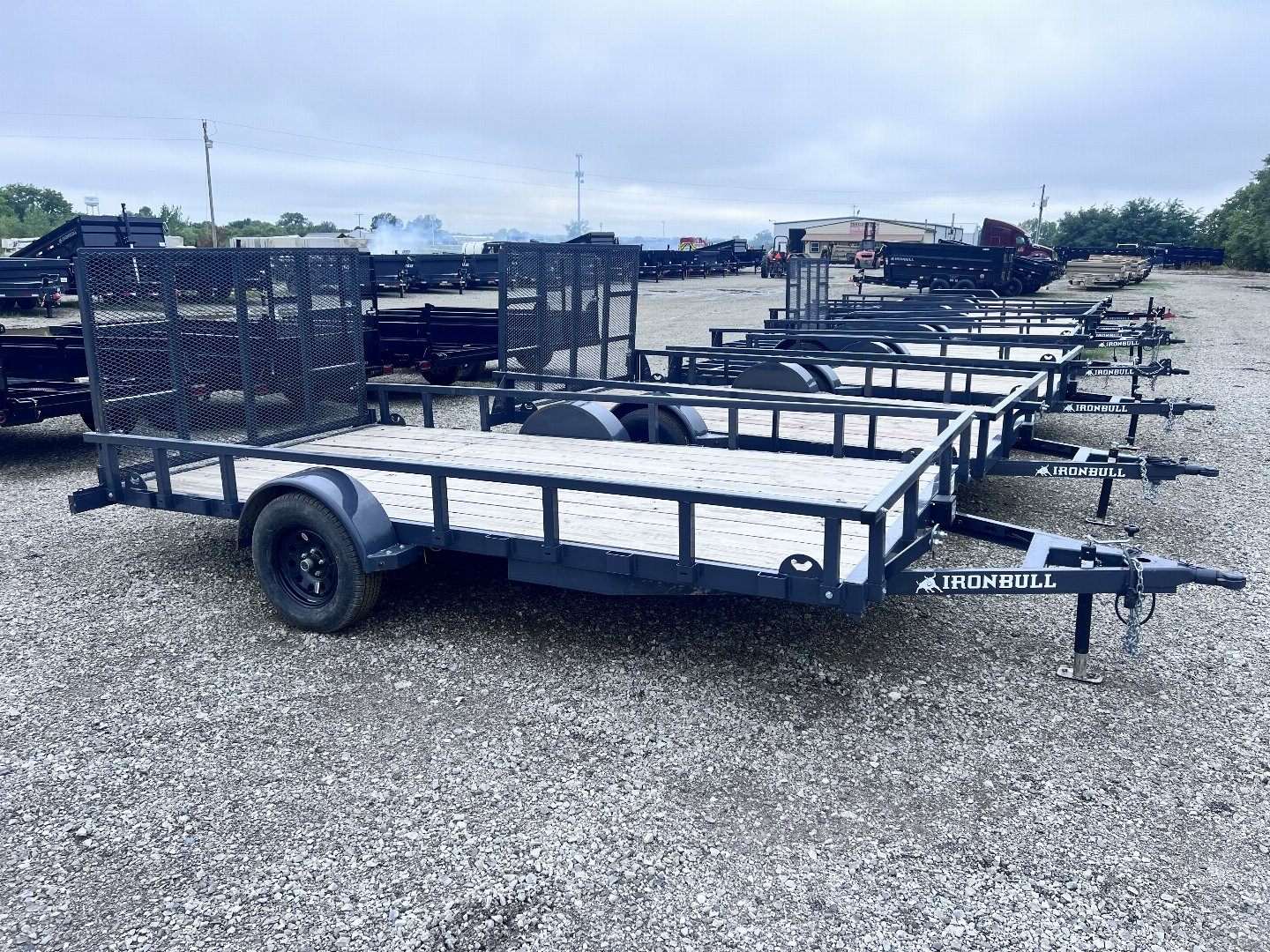 New 2023 IRON BULL 83X14 UTILITY TRAILER W/SINGLE AXLE, BRAKE AND FOLD DOWN SIDES