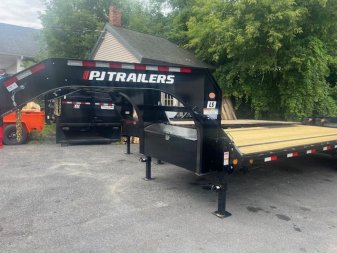 New 2025 PJ TRAILERS 102" x 25' LS Flatbed Trailer with Flip over Monster Ramps