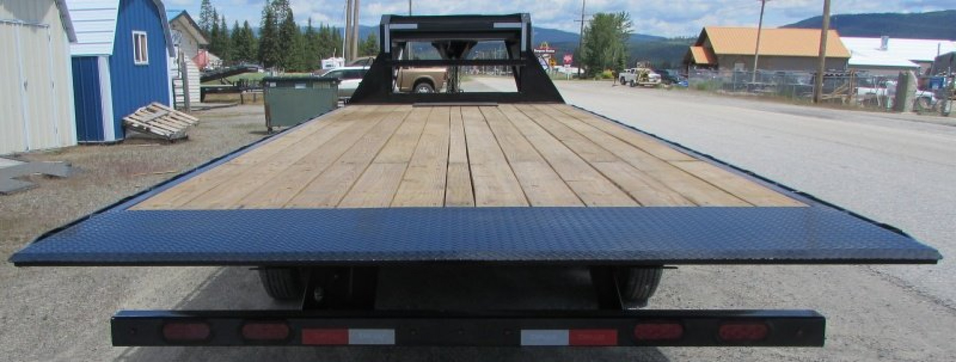 New 2025 Delco Trailers T824R72ESKK Tilt Trailer
