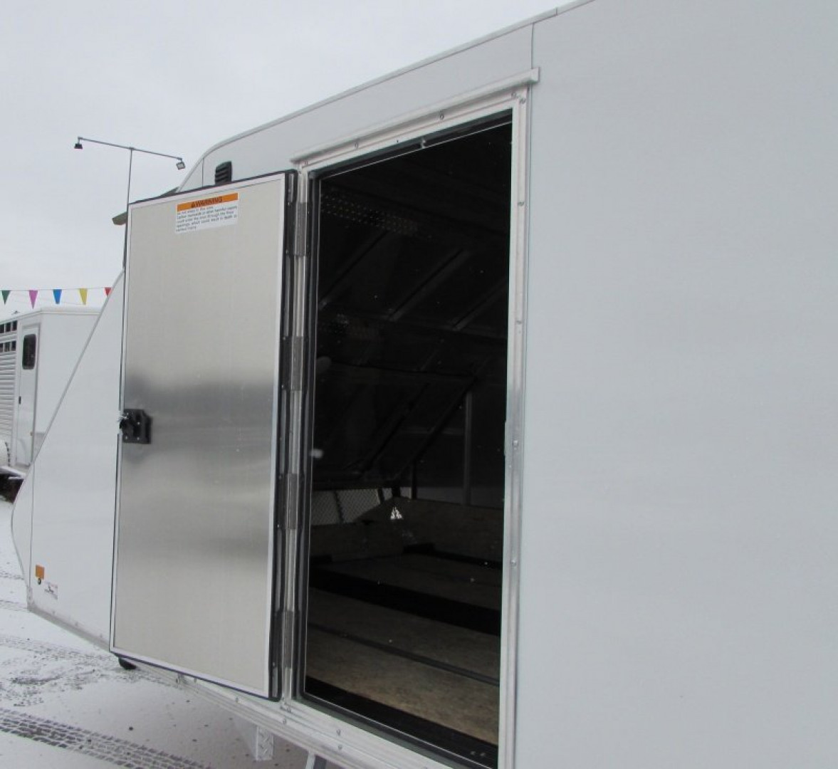 New 2025 SnoPro Trailers HYB101X12 Snowmobile Trailer