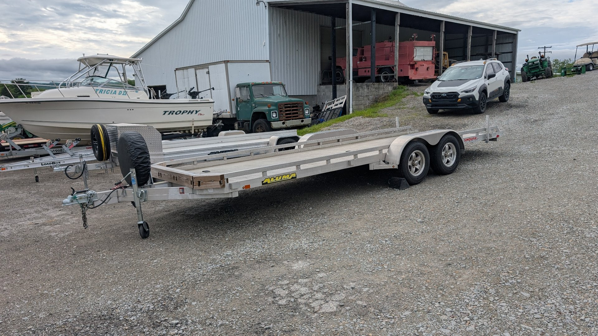 Used 2021 Aluma 6'6" x 20' Tandem Utility Trailer w/ Pull Out Ramps