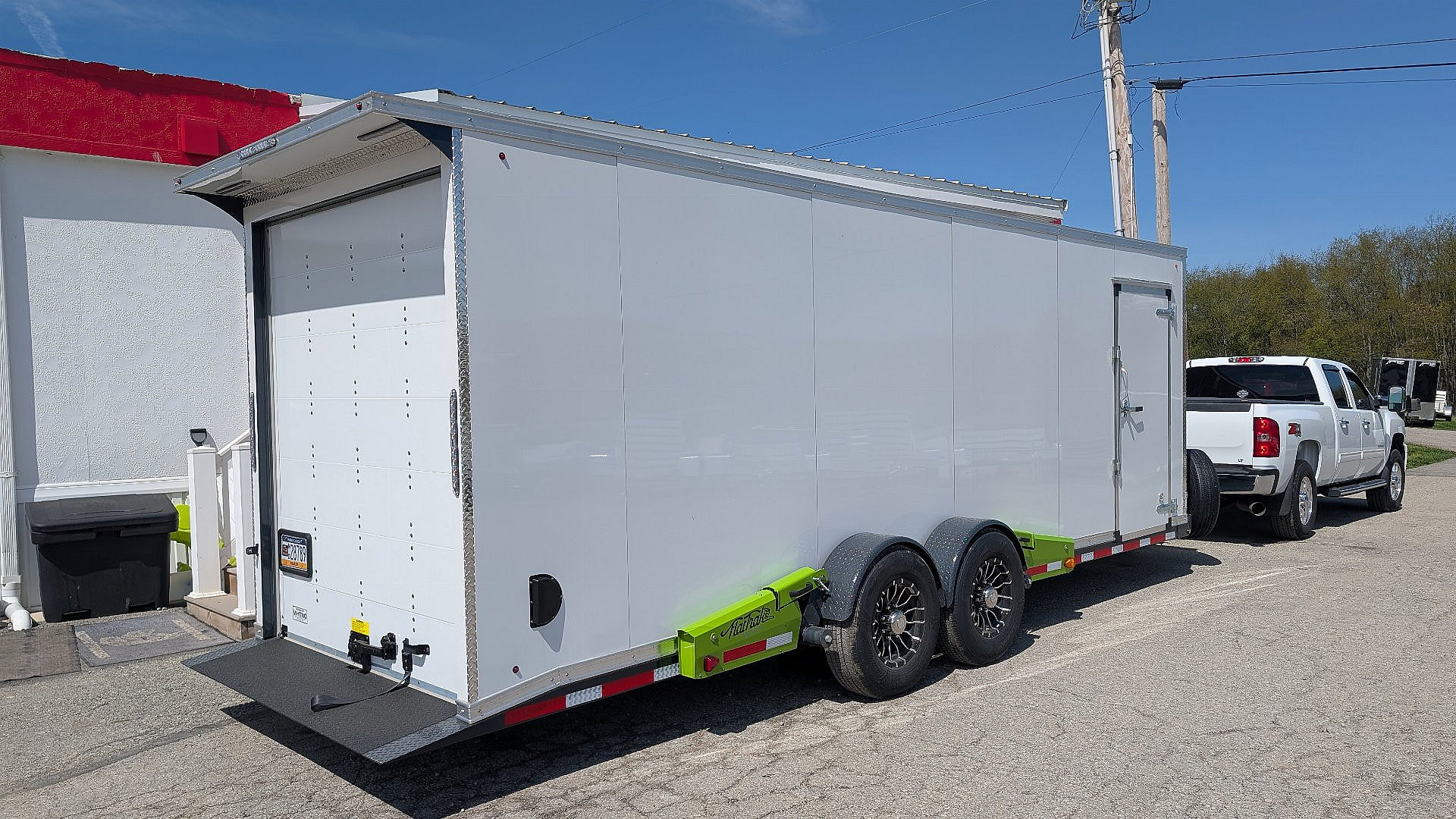 New 2025 FlatTrak 7x22 HD "DROP DECK FLOOR" TILT Cargo Equipment Trailer with Roll Up Rear Door