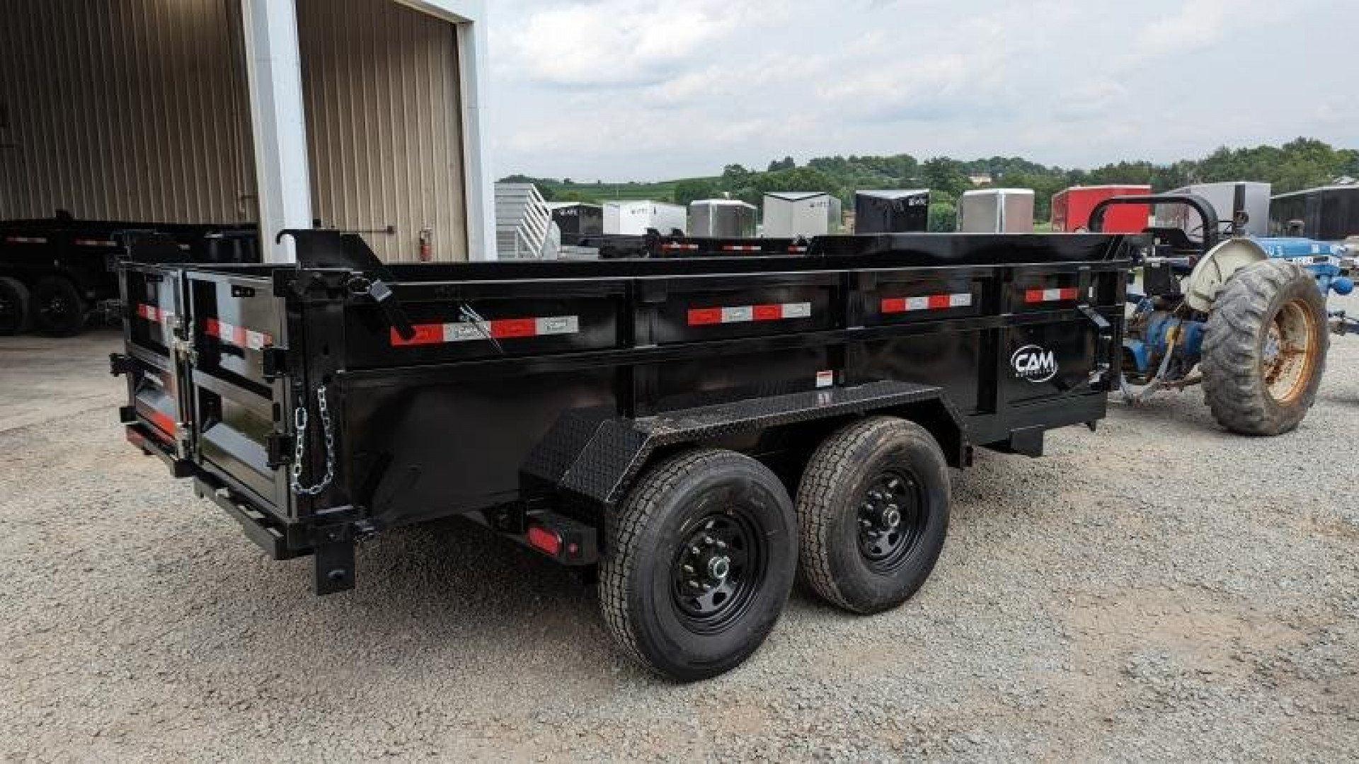 New 2025 CAM Superline 6'10" x 14 HD Scissor Lo Pro Equipment Dump Trailer (7K Axles)