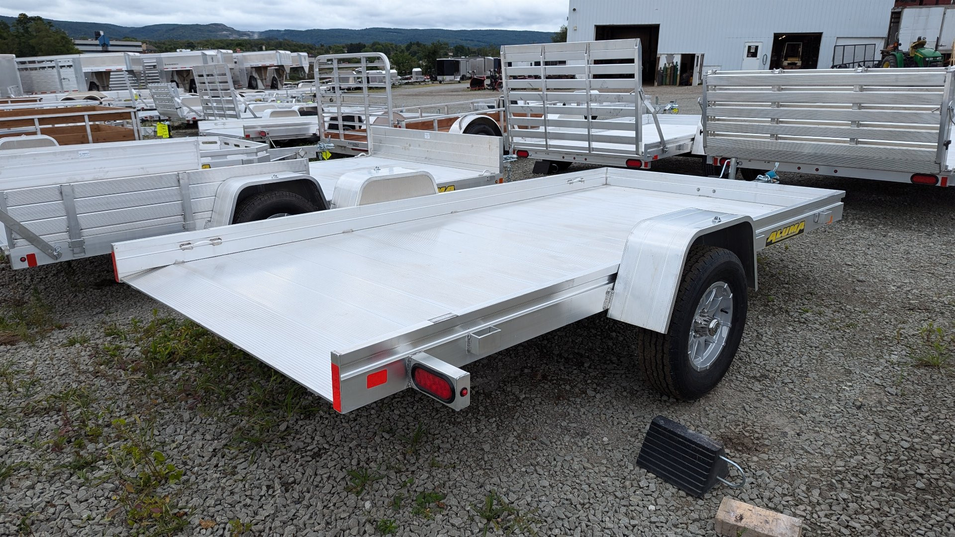 New 2025 Aluma 5'8" x 12 HD TILT Trailer