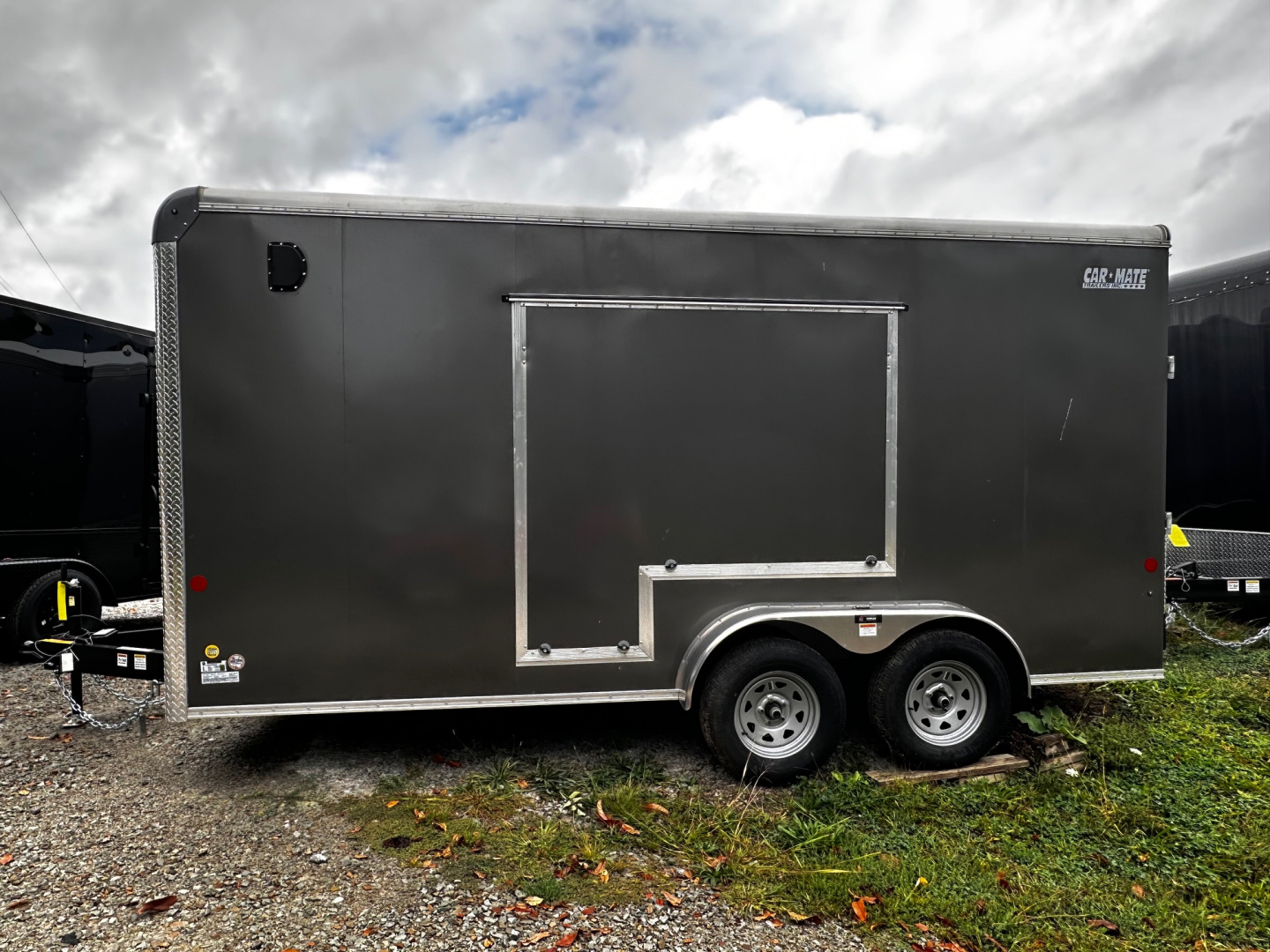New 2025 Car Mate 7x16 HD Custom Cargo Trailer w/ Step-Out Awning Door
