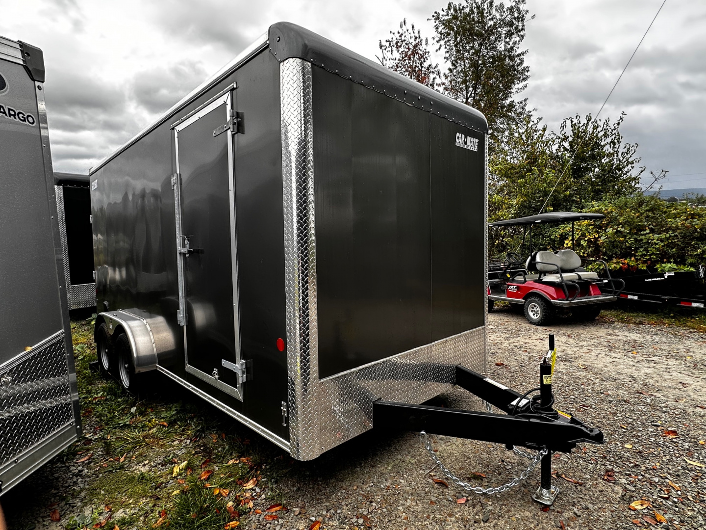 New 2025 Car Mate 7x16 HD Custom Cargo Trailer w/ Step-Out Awning Door