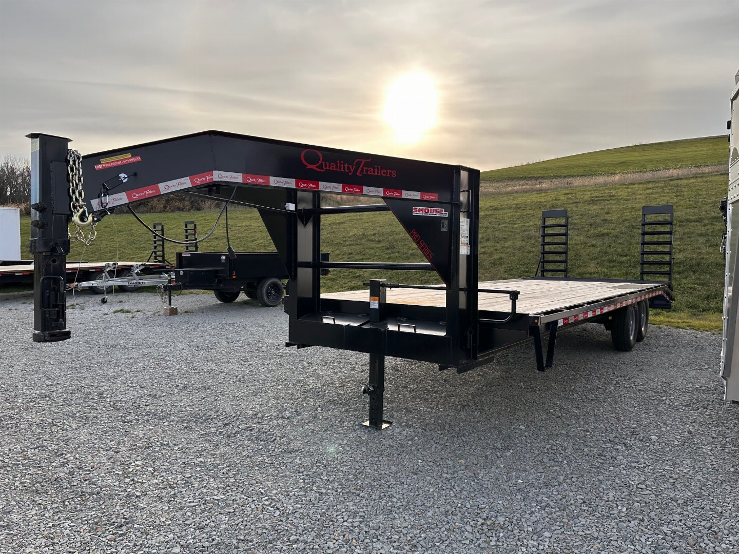 Used 2023 Quality 20+4 Pro Deckover Gooseneck w/ Pop Up Dove Tail