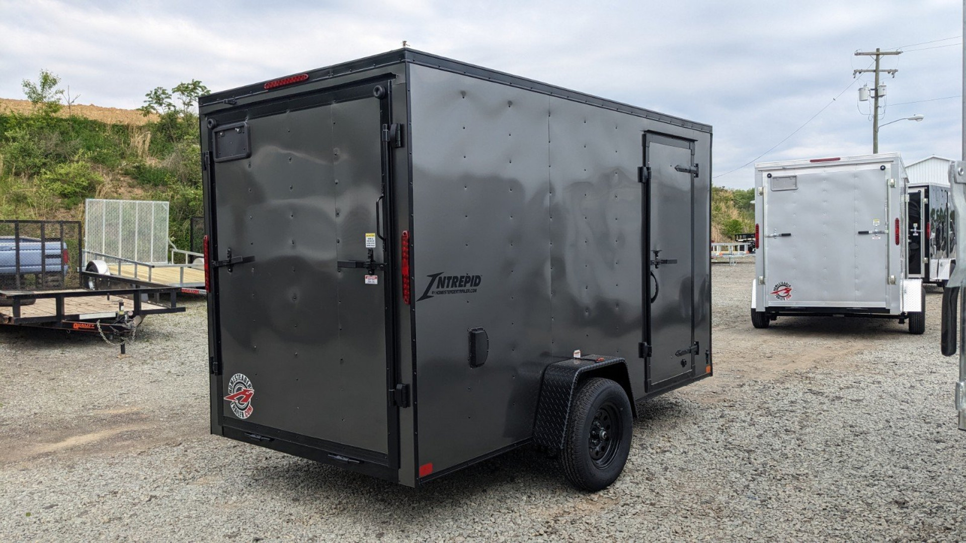 New 2025 Homesteader 6x12 Intrepid V-Nose Cargo Trailer w/ Ramp Door