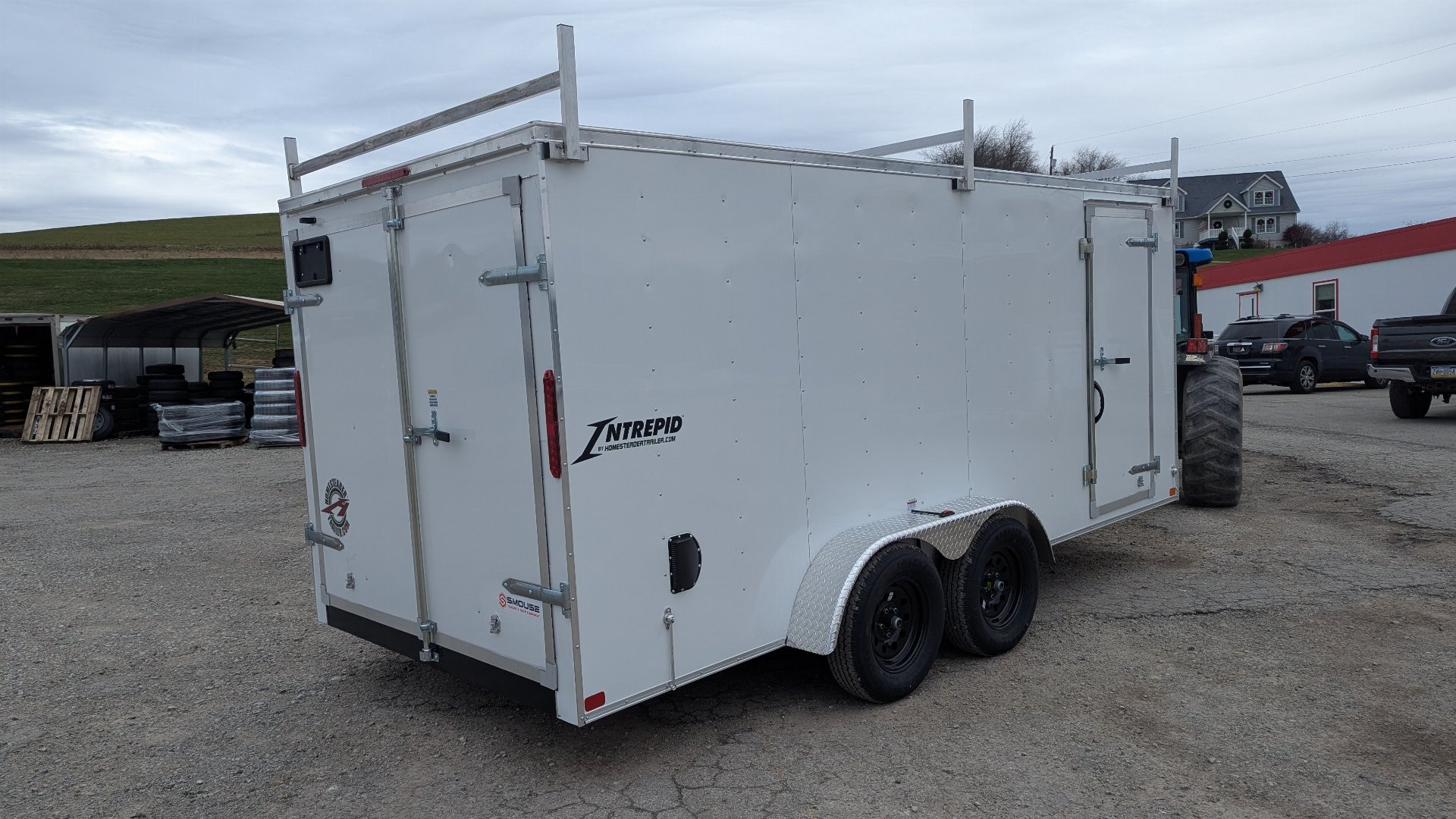 New 2025 Homesteader 7x14 Intrepid V-Nose Contractor Trailer w/ Barn Doors & Ladder Racks