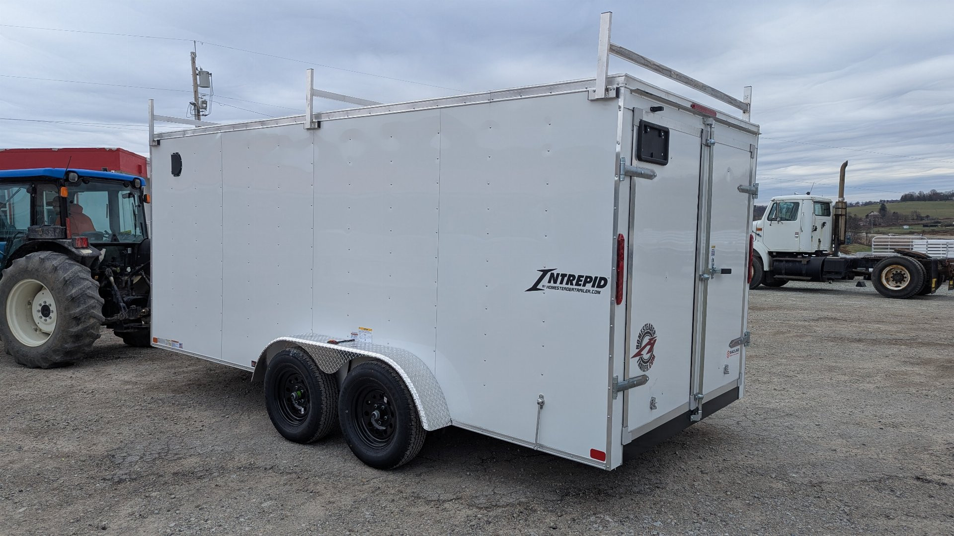 New 2025 Homesteader 7x14 Intrepid V-Nose Contractor Trailer w/ Barn Doors & Ladder Racks