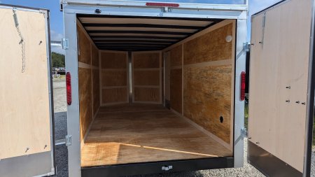 New 2025 Homesteader 7x14 Intrepid V-Nose Contractor Trailer w/ Barn Doors & Ladder Racks