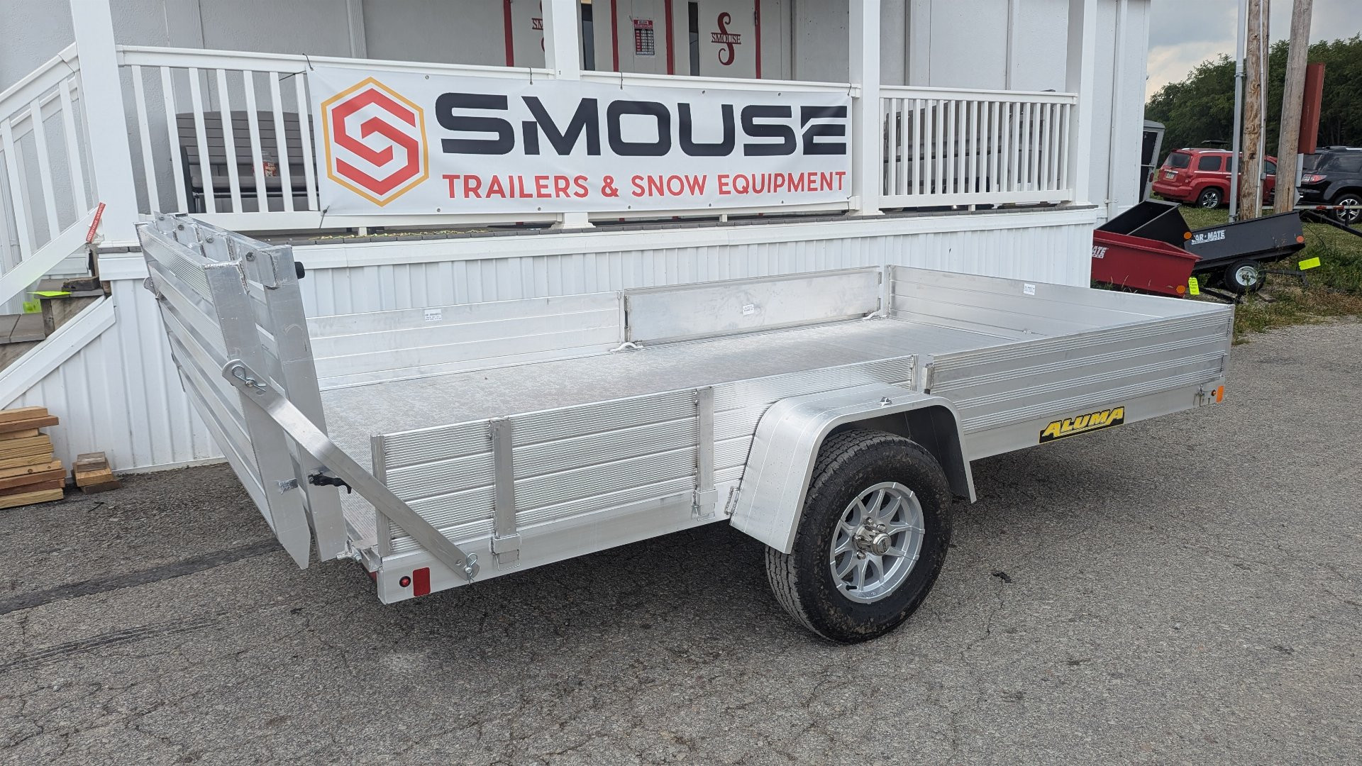 New 2025 Aluma 6'9" x 12 SR Utility Trailer w/ Side Ramps/Solid Rear Sides & Bi-Fold Gate