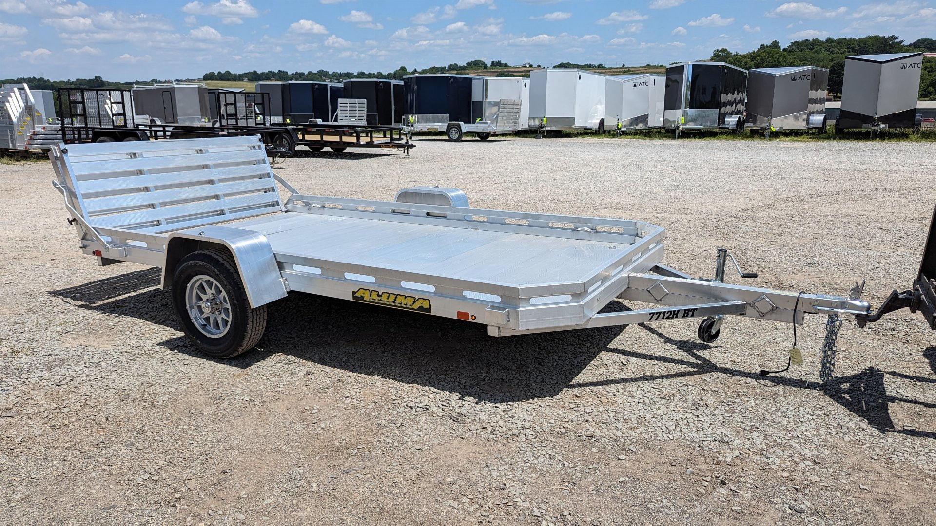 New 2025 Aluma 6'5" x 12 HD Utility Trailer w/ Bi-Fold Gate