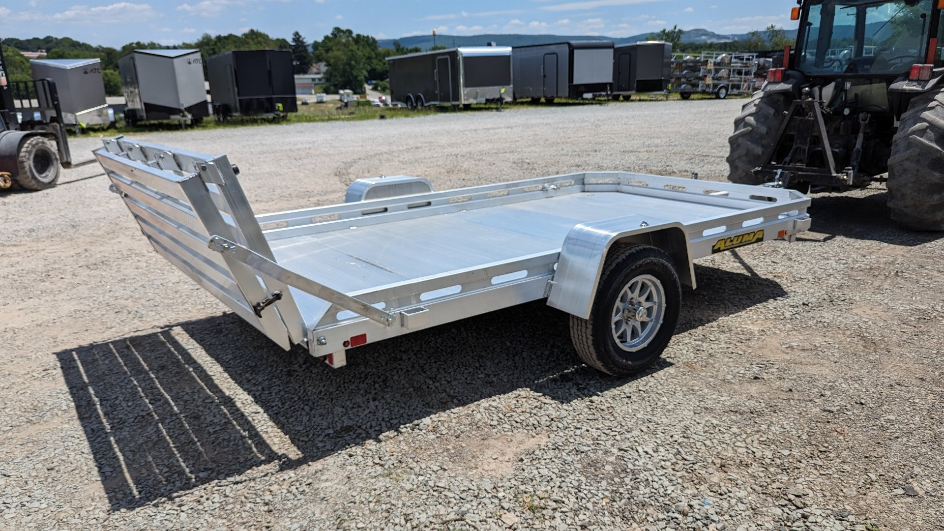 New 2025 Aluma 6'5" x 12 HD Utility Trailer w/ Bi-Fold Gate
